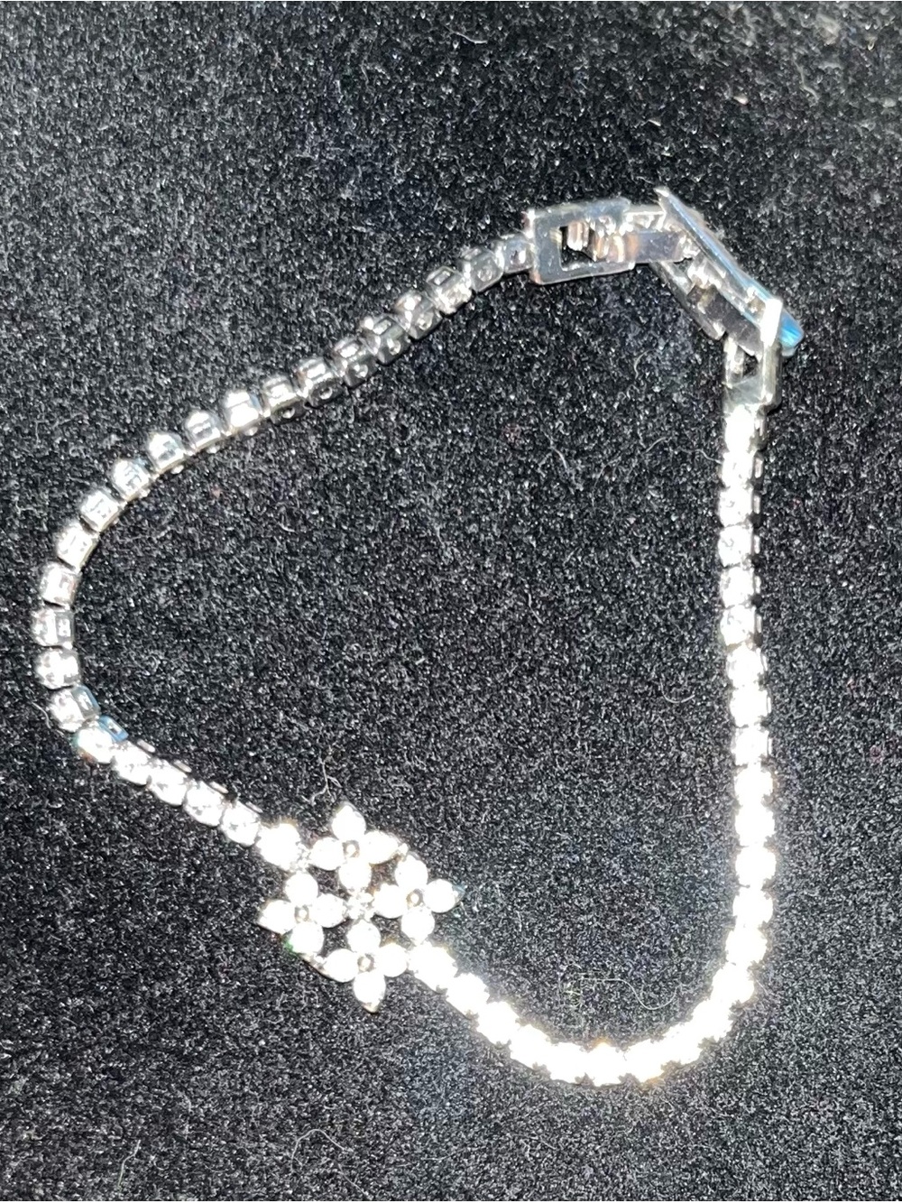 Silver-Tone CZ Tennis Bracelet with Flower Accent